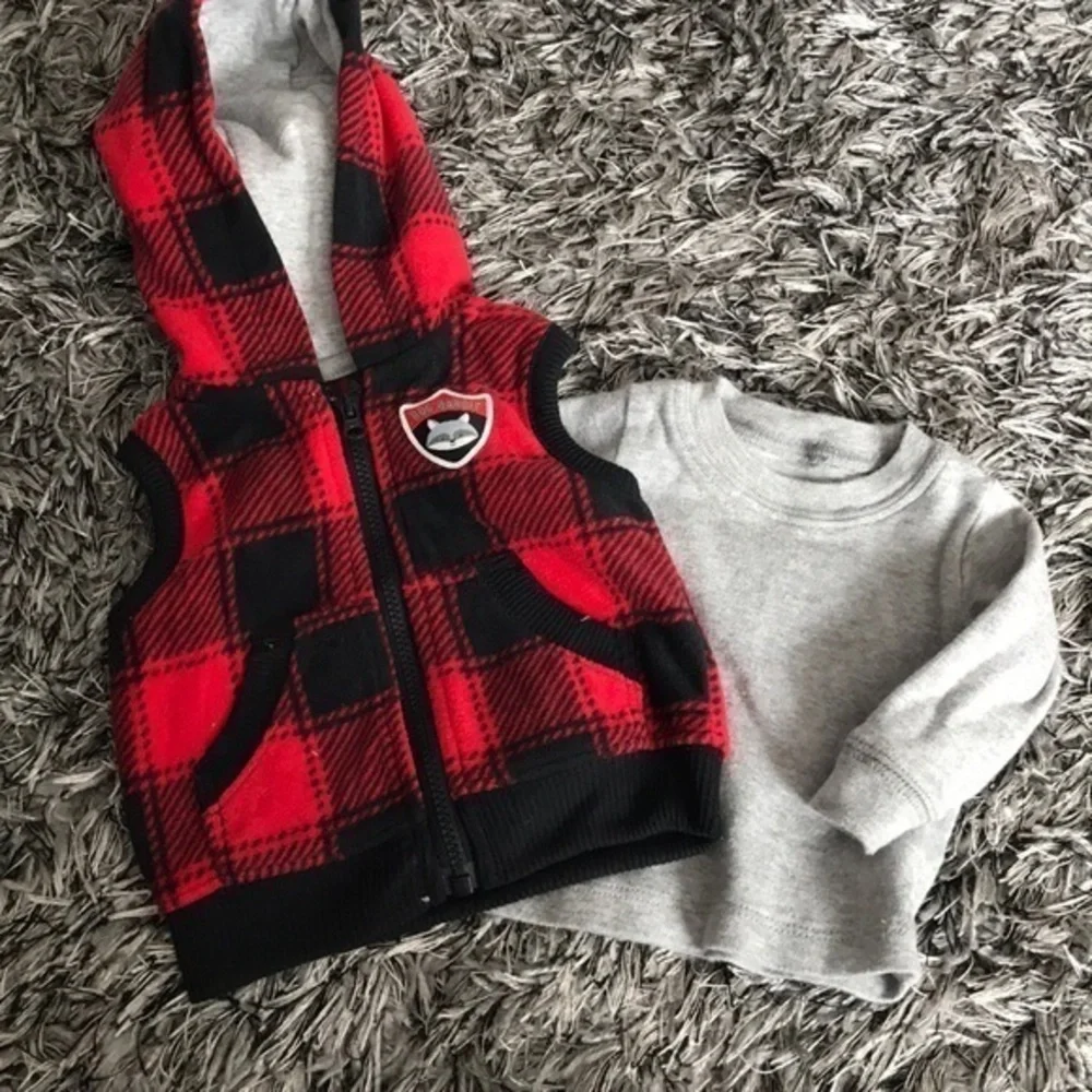 Carters newborn shirt with vest.